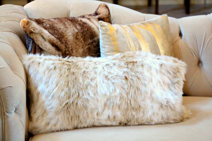 winter white pillows on white sofa- www.yourstrullyjenn.com