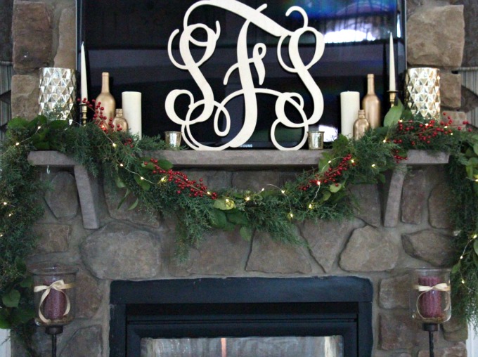 The bride and groom's initials were used in this gorgeous monogram to create the perfect mantel.