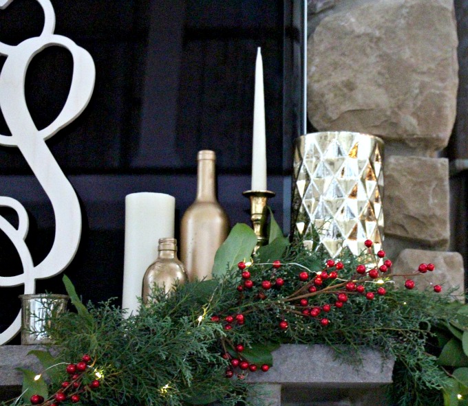 Candles and vases were used as the finishing touches on this mantel.
