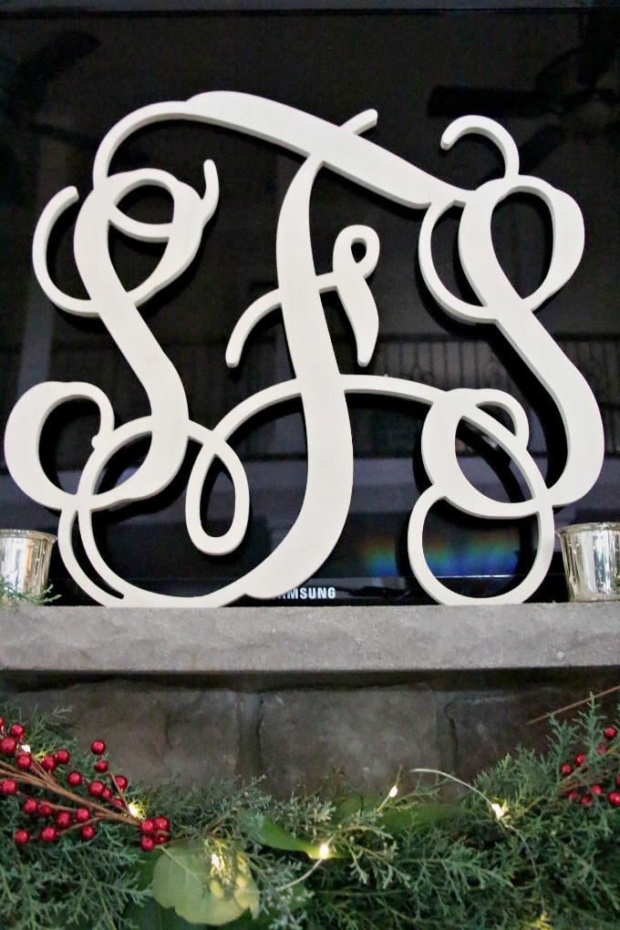 A beautiful monogram was created as a focal piece on this mantel.