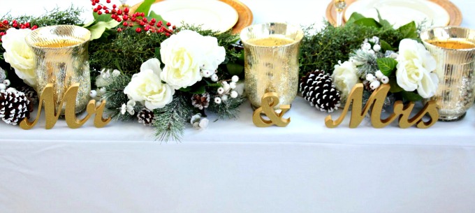 The bride and Groom's table was one of a kind. I decorated it with white and gold accents.