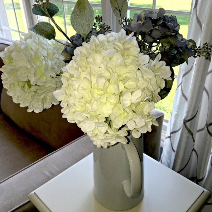 Flowers are a great choice to bring in added pops of color to a room. www.jennelyinteriors.com