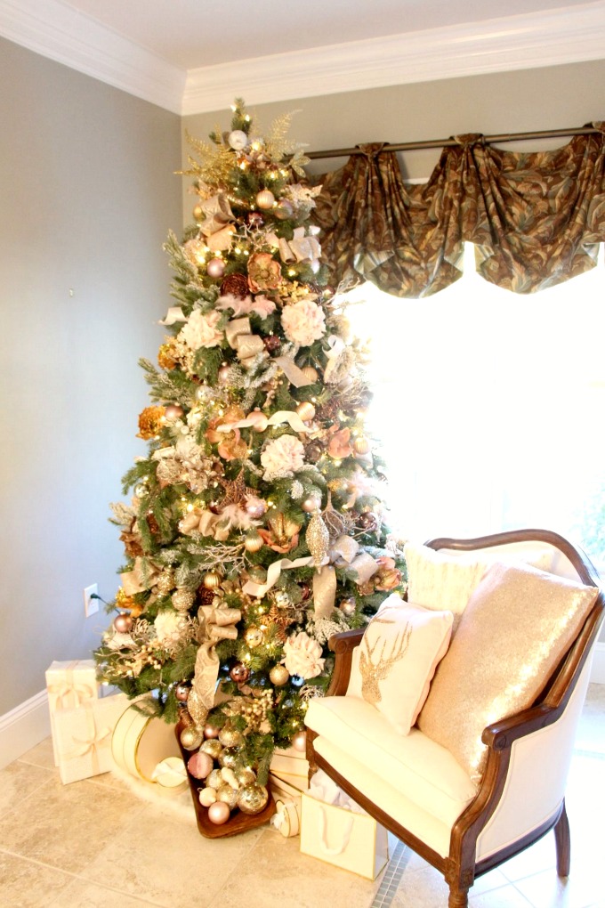 Blush and rose gold Christmas Tree with gold metallic ornaments. www.jennelyinteriors.com