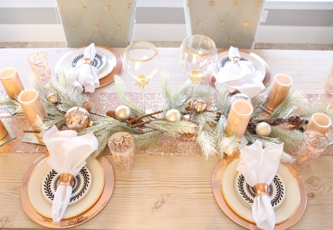 Rose Gold tablescape and rose gold glasses from Anthropology. www.jennelyinteriors.com