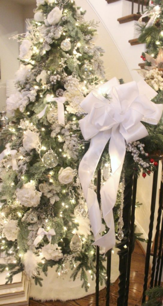 White and clear ornaments were the inspiration for this tree. jennelyinteriors.com