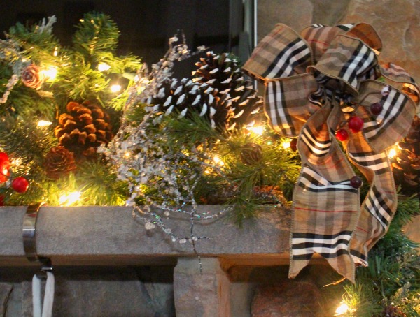 Using the Burberry ribbon in the mantel and your tree gives your home a cohesive look. jennelyinteriors.com