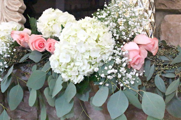 pink roses and white hydrangea Valentine's Day mantel styled by Yours Truly Jenn | www.jennelyinteriors.com