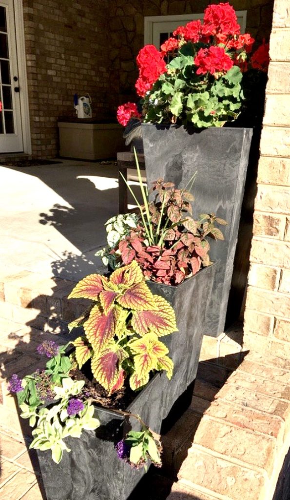 Putting flowers in pots will help complete your outdoor porch area.