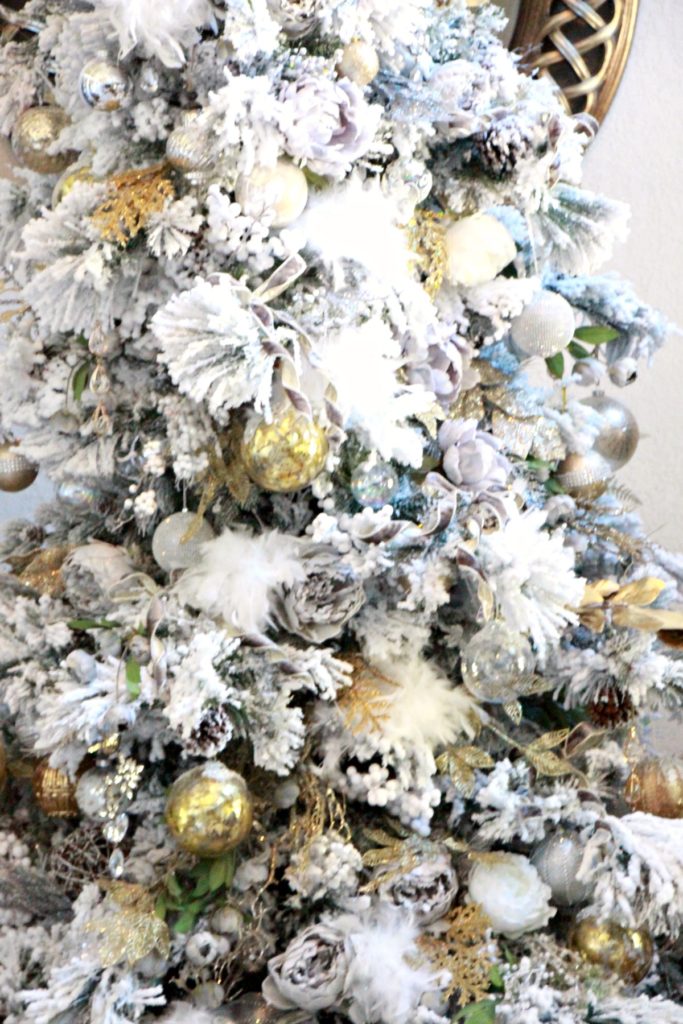 Even when this flocked tree is turned off it's gorgeous. Jenn Ely Interiors