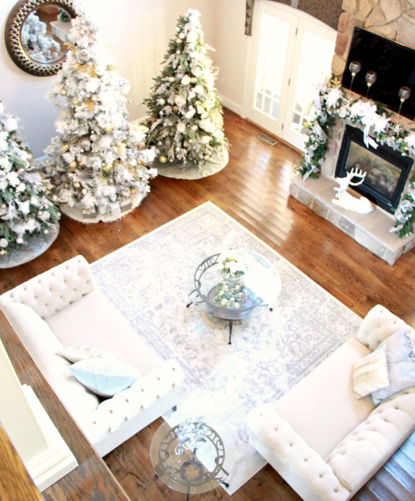 This aerial view of the whole room is so beautiful. The attention to detail was key in this room right down to changing out the rug for Christmas. 