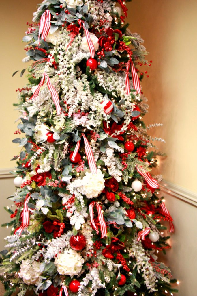 How to change a green tree into a flocked tree without making a mess. Jenn Ely Interiors
